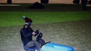 CLAUDE ON HIS MOWER